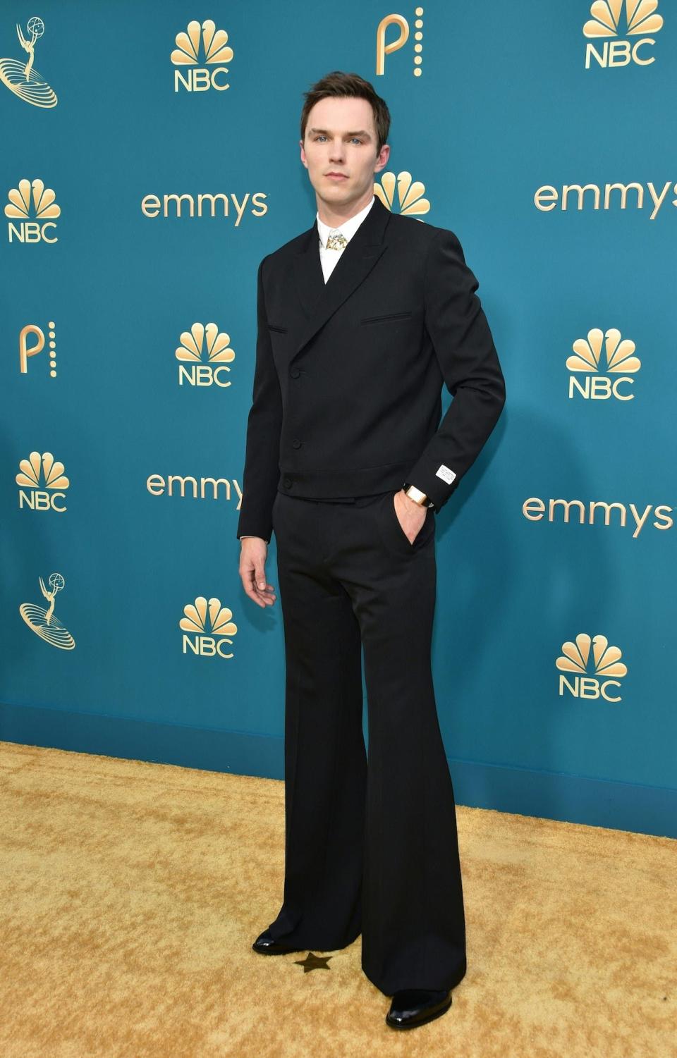 Nicholas Hoult attends the 2022 Emmys.