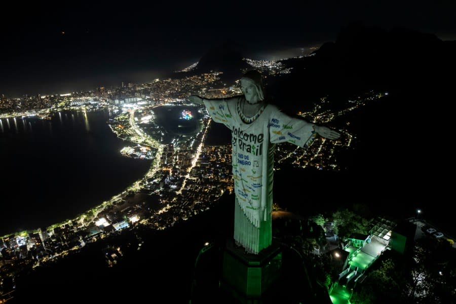 The Christ the Redeemer statue is illuminated with a welcome message for American singer Taylor Swift, in Rio de Janeiro, Brazil, Thursday, Nov. 16, 2023. (AP Photo/Bruna Prado)