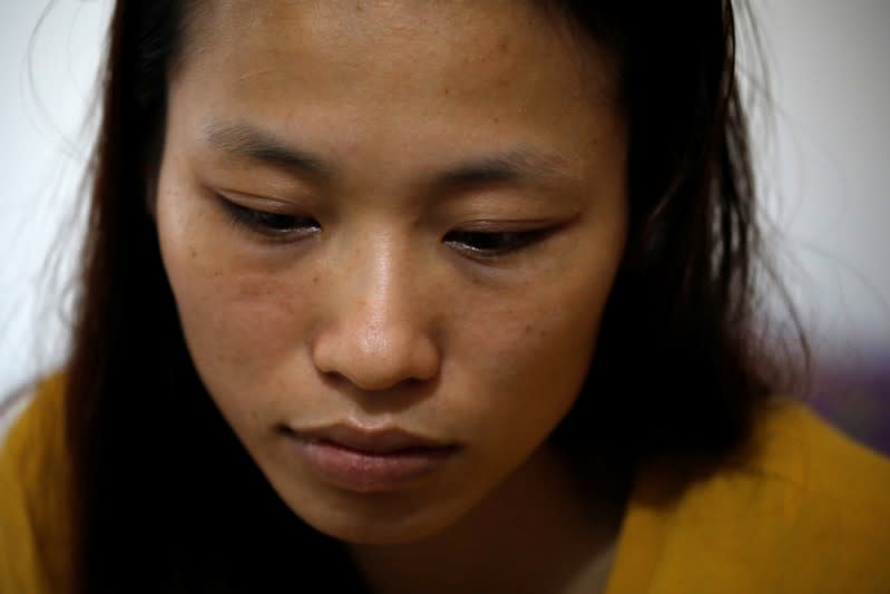 Hoang Thi Thuong, wife of Nguyen Dinh Tu, a Vietnamese suspected victim in a truck container in UK, is seen at their home in Nghe An province