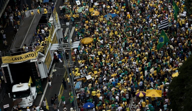 Demonstrators march along Paulista Avenue in Sao Paulo, Brazil, on March 26, 2017 during a nationwide protest against political corruption