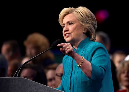 U.S. Democratic Presidential candidate Hillary Clinton speaks at the American Federation of State, County and Municipal Employees convention in Las Vegas, Nevada, U.S. July 19, 2016. REUTERS/David Becker