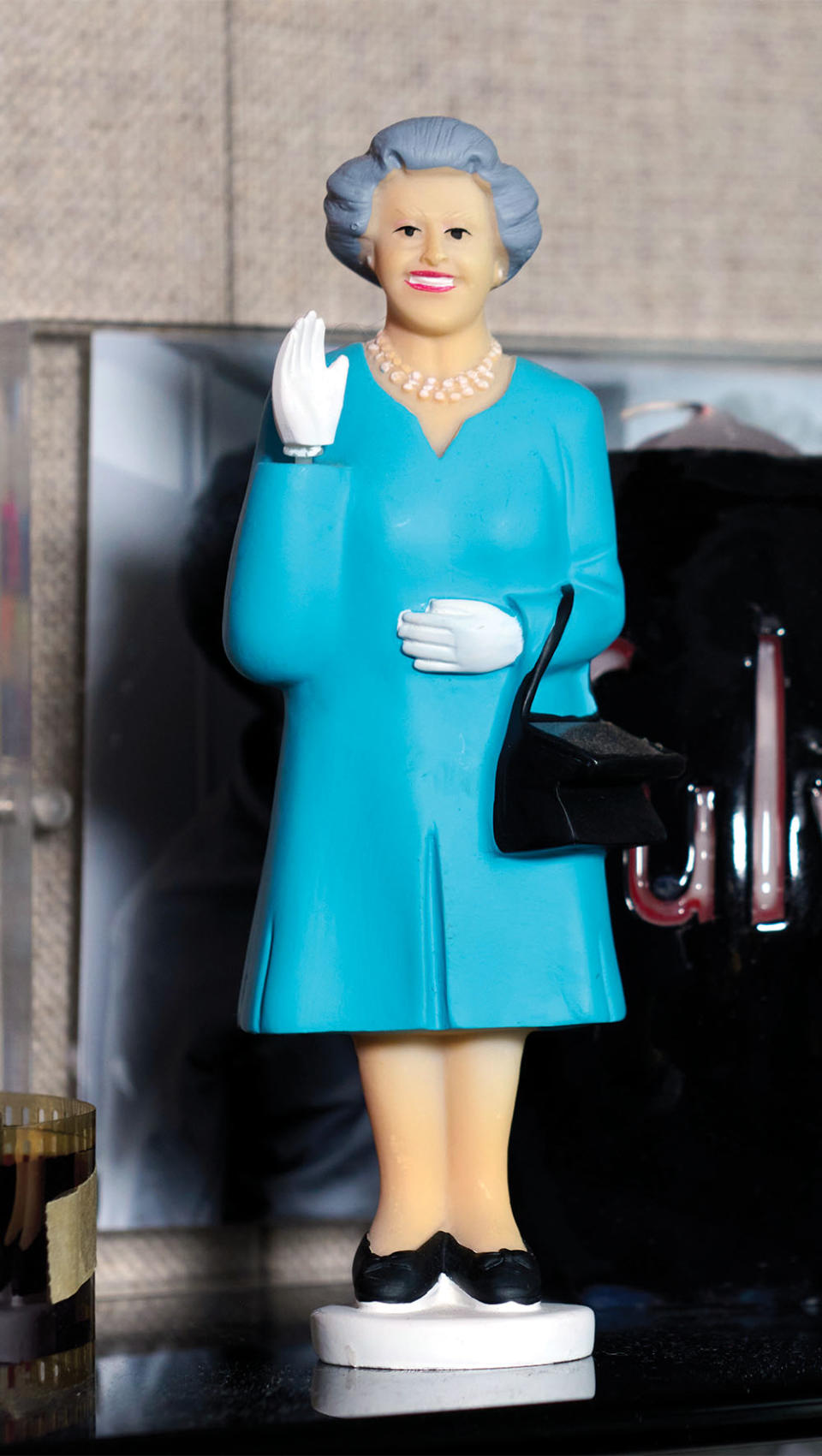 A figurine of Queen Elizabeth II: “I am very British, and it’s her jubilee celebration.” - Credit: Photographed by Yasara Gunawardena
