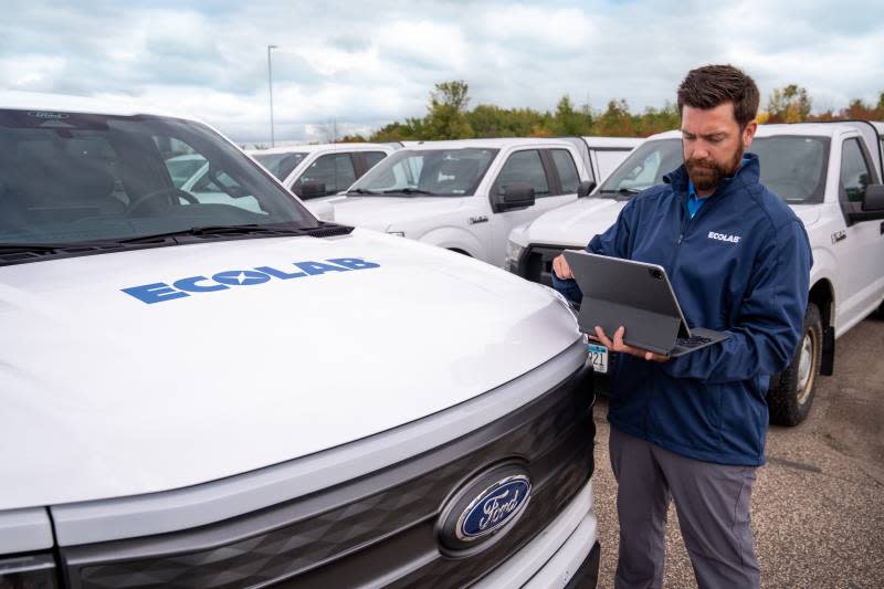 Ecolab of St. Paul, Minnesota purchased Ford F-150 Lightning pickups to use as service vehicles in California, the automaker announced Tuesday, Jan. 30, 2024. This image depicts the actual vehicle wrap on 2023 models used for an employee demonstration.