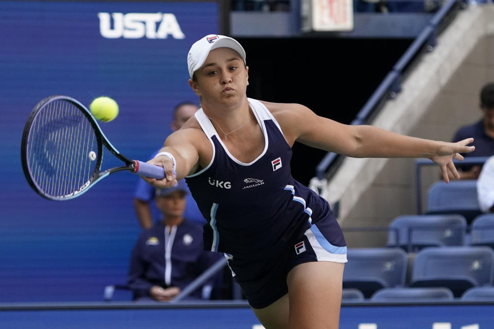 Ashleigh Barty, of Australia, returns a shot to Clara Tauson, of Denmark, during the second round of the US Open tennis championships, Thursday, Sept. 2, 2021, (AP Photo/Elise Amendola)