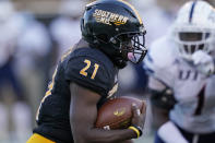 Southern Mississippi running back Frank Gore Jr. (21) carries the ball for a first down against UTSA during the second half of an NCAA college football game, Saturday, Nov. 21, 2020, in Hattiesburg, Miss. UTSA won 23-20. (AP Photo/Rogelio V. Solis)