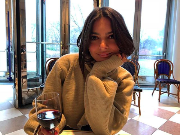 Em was pictured drinking wine in early March. Photo: Instagram/emrata