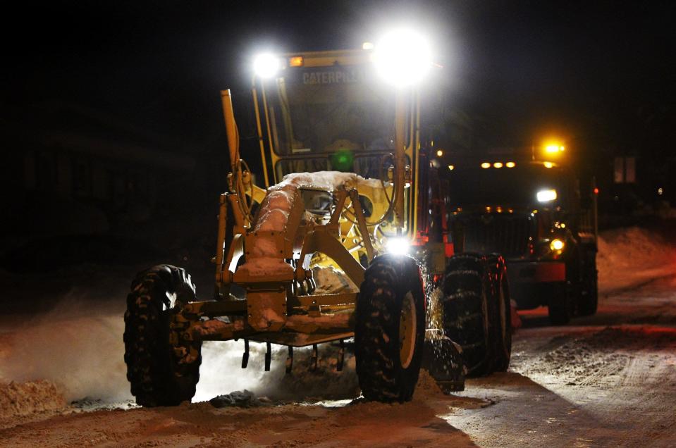 A City of Erie grader, followed by a regular plow truck, moves north in the 3900 block of Ellsworth Avenue on Jan. 2, 2018. Crews worked around the clock to improve road conditions after the previous week's record-setting snowfall.