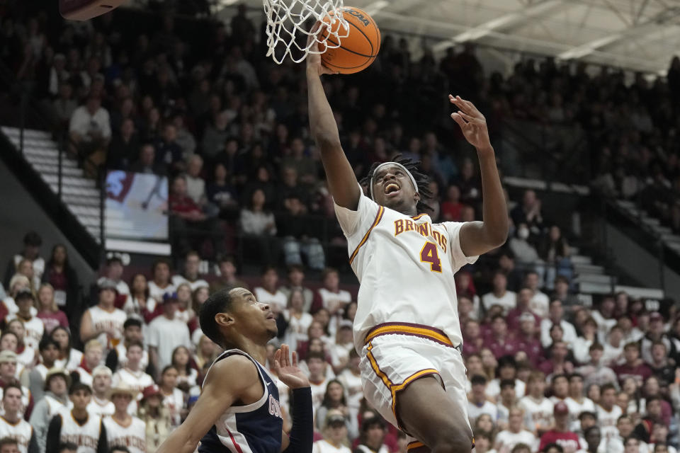 Santa Clara guard Adama Bal (4) shoots against Gonzaga guard Nolan Hickman during the first half of an NCAA college basketball game in Santa Clara, Calif., Thursday, Jan. 11, 2024. (AP Photo/Jeff Chiu)