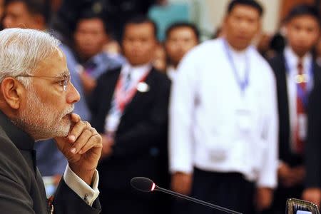 Prime Minister Narendra Modi attends the 12th ASEAN-India Summit during the 25th ASEAN Summit at the Myanmar International Convention Centre in Naypyitaw November 12, 2014. REUTERS/Soe Zeya Tun