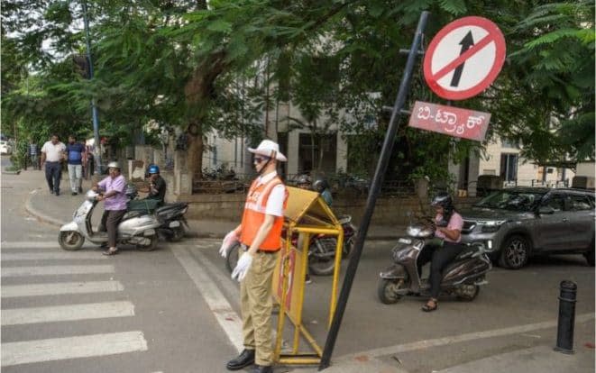 Mannequins dressed up as traffic police have been placed on roads in the southern city of Bangalore - Asif Saud/BBC