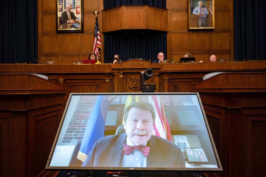 Food and Drug Administration Commissioner Robert Califf testifies via video during a House Commerce Oversight and Investigations subcommittee hybrid hearing on the nationwide baby formula shortage on Wednesday, May 25, 2022, in Washington. (AP Photo/Kevin Wolf)