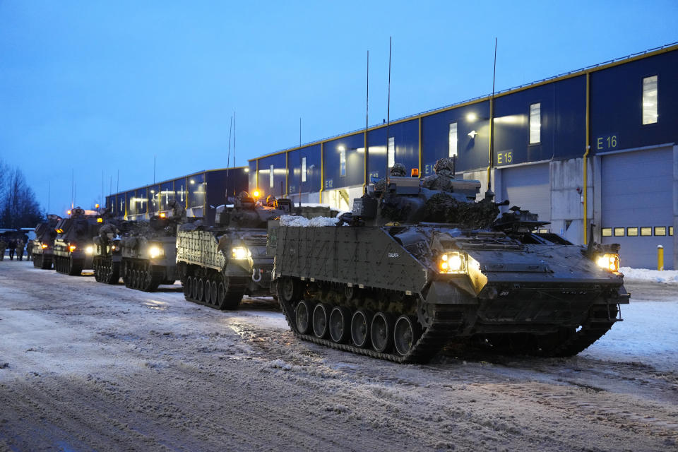 Britain's armoured vehicles prepare to move at the Tapa Military Camp, in Estonia, Thursday, Jan. 19, 2023. Britain's Defense Secretary Ben Wallace said his country would send at least three batteries of AS-90 artillery, armored vehicles, thousands of rounds of ammunition and 600 Brimstone missiles, as well as the squadron of Challenger 2 tanks. (AP Photo/Pavel Golovkin)