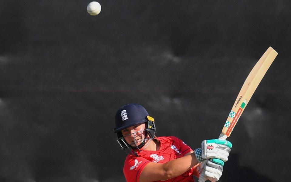 England's Alice Capsey hits a four during the Group B T20 women's World Cup cricket match between Ireland and England at Boland Park in Paarl on February 13, 2023 - RODGER BOSCH/AFP via Getty Images