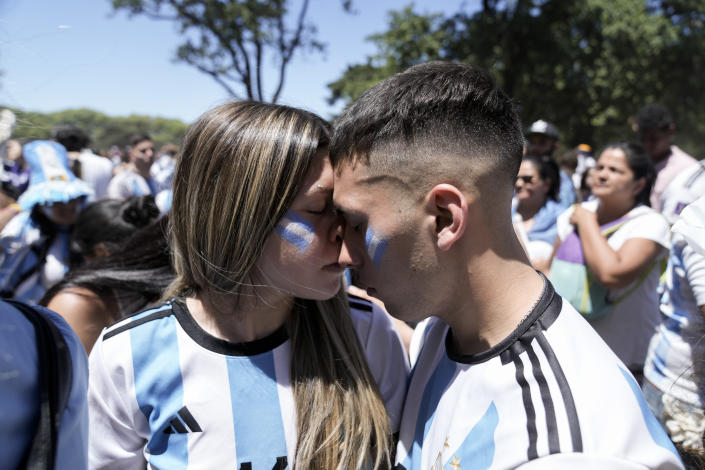 Argentine soccer fans react to France scoring a goal during the World Cup final soccer match between Argentina and France in Buenos Aires, Argentina, Sunday, Dec. 18, 2022. (AP Photo/Rodrigo Abd)