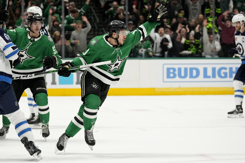 Dallas Stars center Logan Stankoven (11) celebrates after scoring against the Winipeg Jets during the first period of an NHL hockey game in Dallas, Thursday, Feb. 29, 2024. (AP Photo/Tony Gutierrez)