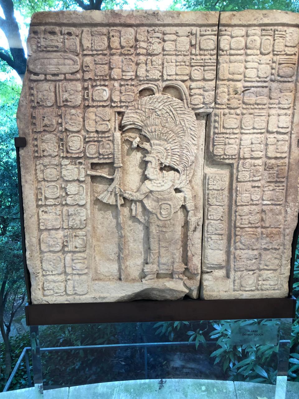 A carved limestone wall panel, probably from El Cayo Chiapas, Mexico, sits in the Philip Johnson wing of Dumbarton Oaks.