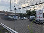 U.S. Postal Service vehicles sit in a parking lot of a facility where authorities said a postal employee fatally shot two workers before dying from a self-inflicted gunshot Wednesday, Oct. 13, 2021 in Memphis, Tenn. The U.S. Postal Inspection service and other federal agencies are investigating Tuesday's shooting, which took place at a postal annex located in a historic Memphis neighborhood. The victims and the shooter have not been identified. (AP Photo/Adrian Sainz)