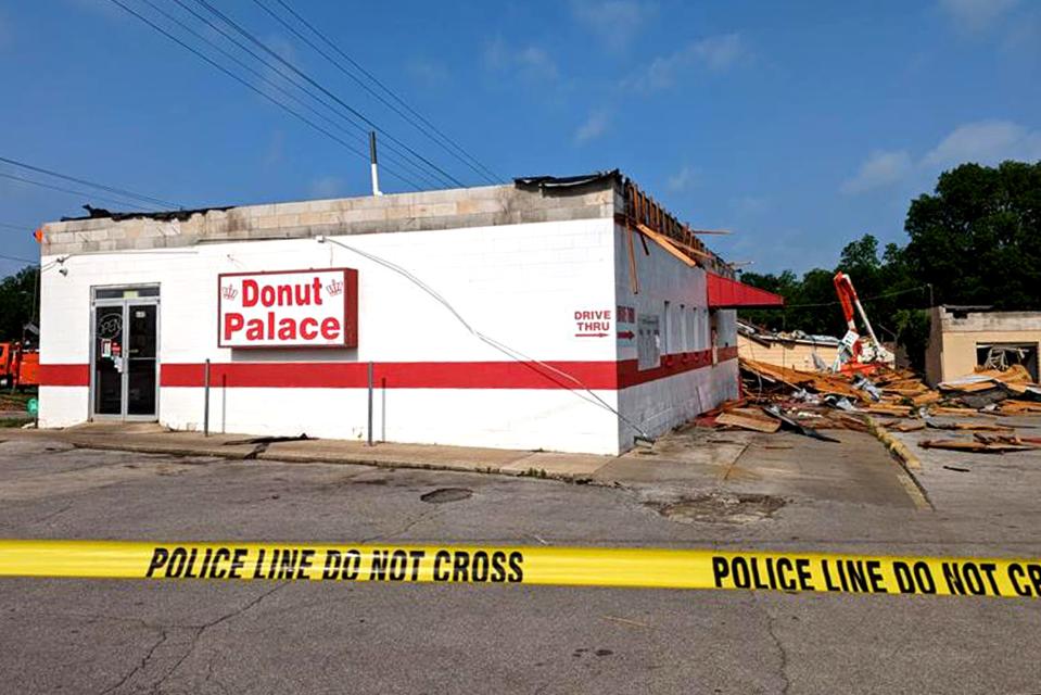 Damage to the roof of Donut Palace in Noble was visible Friday.