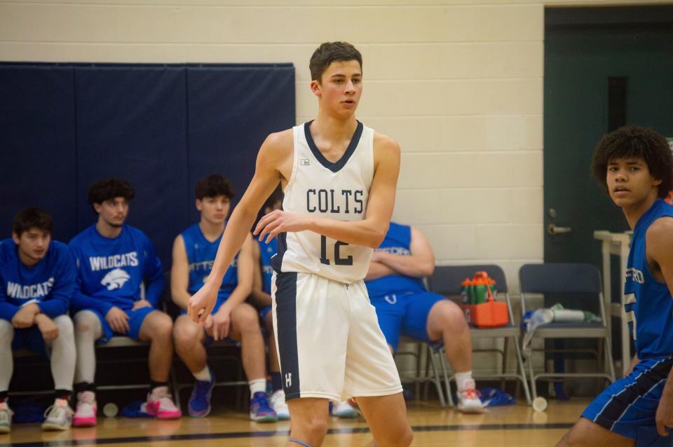 Dawson Scharer (12) scored 12 points to lead the Colts against Pittsford.