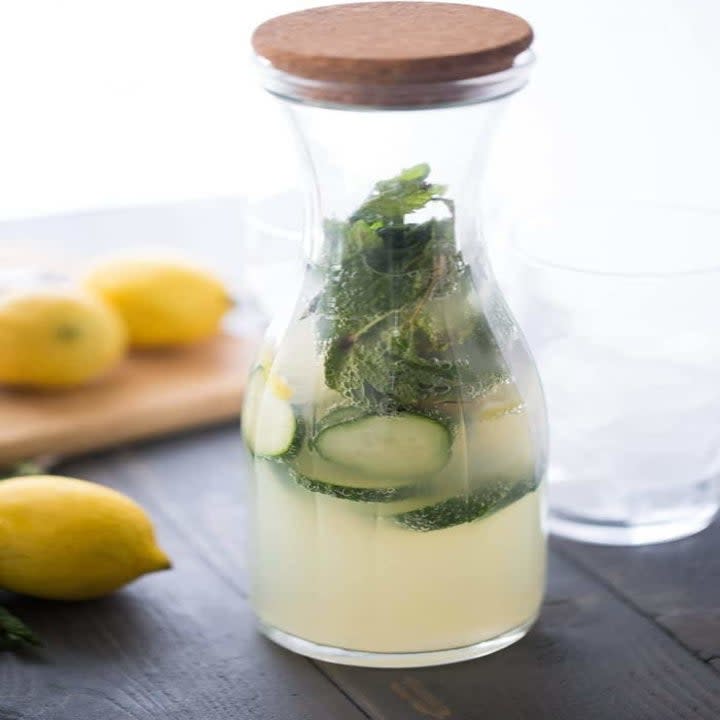 A pitcher of cucumber mint cooler.