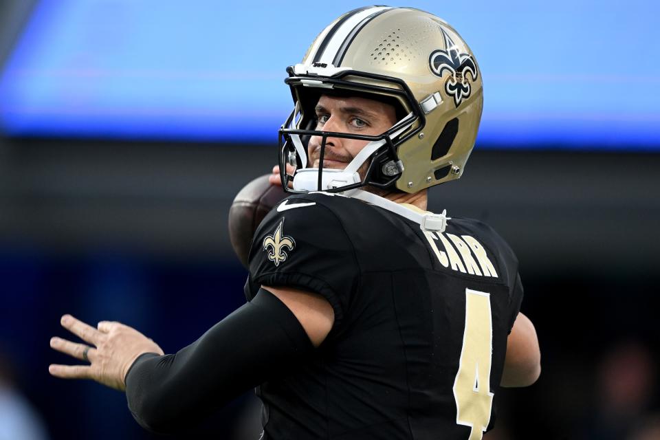 CHARLOTTE, NORTH CAROLINA - SEPTEMBER 18: Derek Carr #4 of the New Orleans Saints warms up prior to the game against the Carolina Panthers at Bank of America Stadium on September 18, 2023 in Charlotte, North Carolina. (Photo by Grant Halverson/Getty Images)