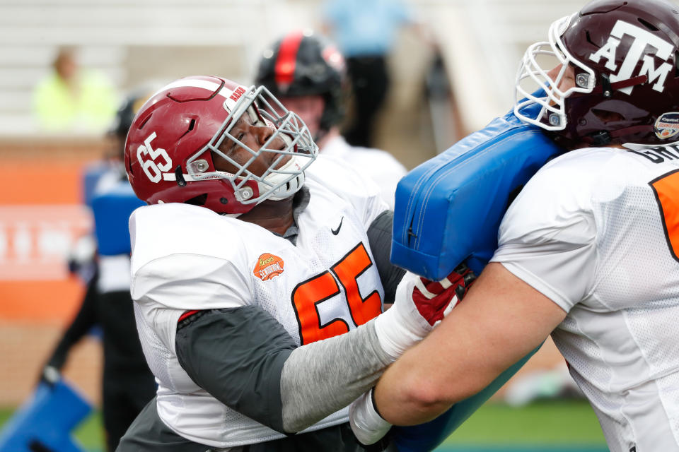 Alabama OG Deonte Brown (left) is the heaviest player at the 2021 Reeses Senior Bowl. (Photo by Senior Bowl/Collegiate Images/Getty Images)