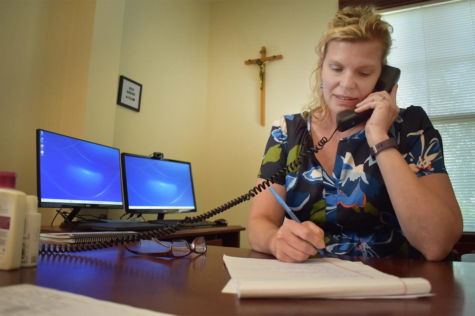 Carolyn Shipp, director of the Diocese of Fall River's Office of Safe Environment, works in her office at the chancery in Fall River on Tuesday, July 16, 2024.