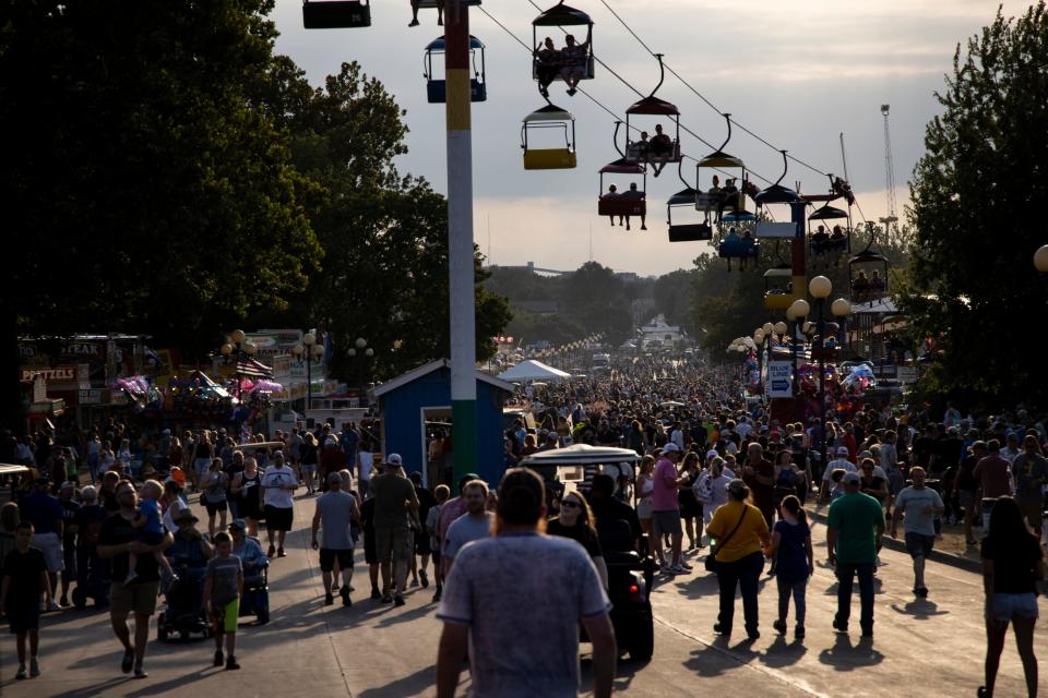 People walk around the Grand Concourse at the Iowa State Fair in 2021.