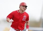 FILE PHOTO: Mar 7, 2019; Tempe, AZ, USA; Los Angeles Angels center fielder Mike Trout (27) runs to third base after hitting a triple against the Los Angeles Dodgers in the first inning at Tempe Diablo Stadium. Mandatory Credit: Rick Scuteri-USA TODAY Sports