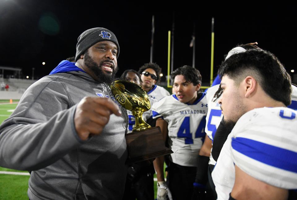 Estacado's head football coach William Blaylock speaks to his team after defeating Canyon in a Class 4A Division I area-round high school football game, Friday, Nov. 17, 2023, at Bain-Schaeffer Buffalo Stadium in Canyon.