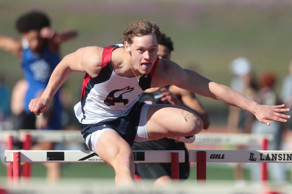 Seaman junior Aaron Merritt places first in the 110 meter hurdles at the Lansing Invitational with a time of 15.79 Thursday, April 7, 2023.