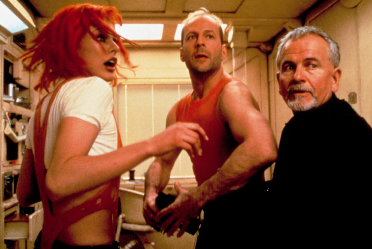 Milla Jovovich, Willis and Ian Holm in The Fifth Element. (Photo: ©Columbia Pictures/Courtesy Everett Collection)