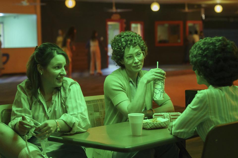 This image released by Hulu shows Jessie Mueller, from left, Jessica Biel and Selena Anduze in the series "Candy." (Hulu via AP)