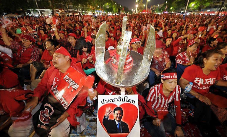 "Red Shirt" anti-government protesters gather to mark the first anniversary of clashes between government troops and protesters in Bangkok. Tens of thousands of anti-government "Red Shirts" gathered in Bangkok on Sunday to mark a year since deadly clashes between troops and protesters during their mass rally in the capital