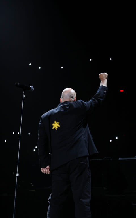 Billy Joel wears a jacket with the Star of David during the encore of his 43rd sold out show at Madison Square Garden on August 21, 2017 in New York City - Credit: Getty