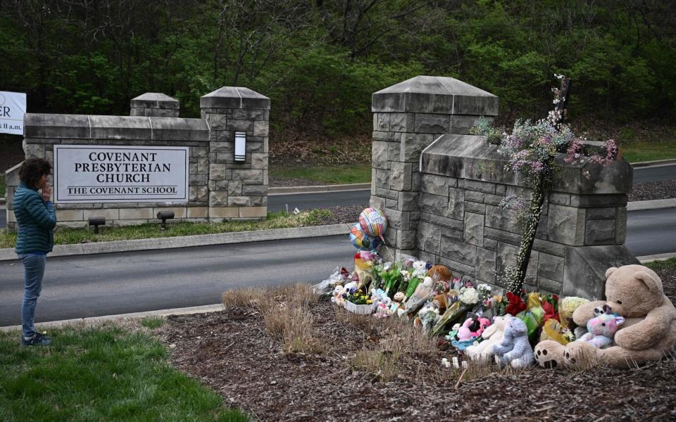 A makeshift memorial for victims outside the Covenant School building with flowers and cuddly toys - Brendan Smialowski/AFP via Getty Images