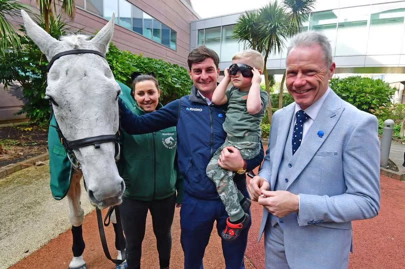 Neptune Collonges (winner 2012) with Henry Brooke and Mick Fitzgerald (winner 1996) at Alder Hey Children's Hospital