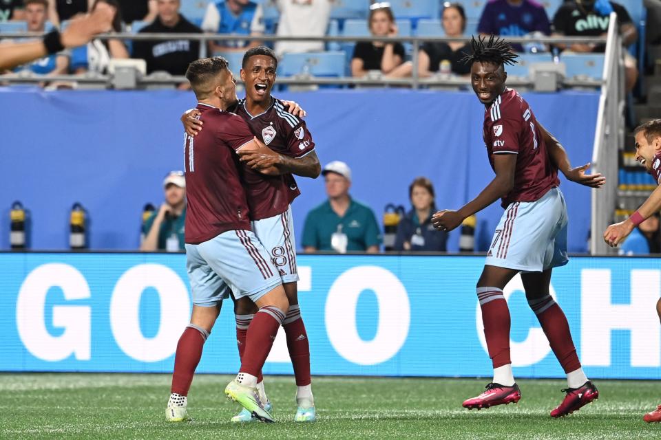 Colorado Rapids midfielder Max Alves (8) celebrates with forward Diego Rubio (11) and forward Darren Yapi (77) after scoring a goal in the second half at Bank of America Stadium.