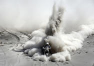 South Africa's Riaan Van Niekerk rides his KTM during the 5th stage of the Dakar Rally 2013 from Arequipa in Peru to Arica in Chile, January 9, 2013. Picture taken January 9, 2013. REUTERS/Jacky Naegelen (CHILE - Tags: SPORT MOTORSPORT TPX IMAGES OF THE DAY)