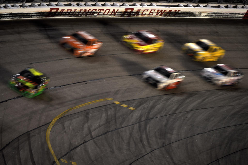 DARLINGTON, SC - SEPTEMBER 06: Kyle Larson, driver of the #42 Mello Yello Chevrolet, leads a pack of cars during the NASCAR Sprint Cup Series Bojangles' Southern 500 at Darlington Raceway on September 6, 2015 in Darlington, South Carolina. (Photo by Jonathan Moore/Getty Images)