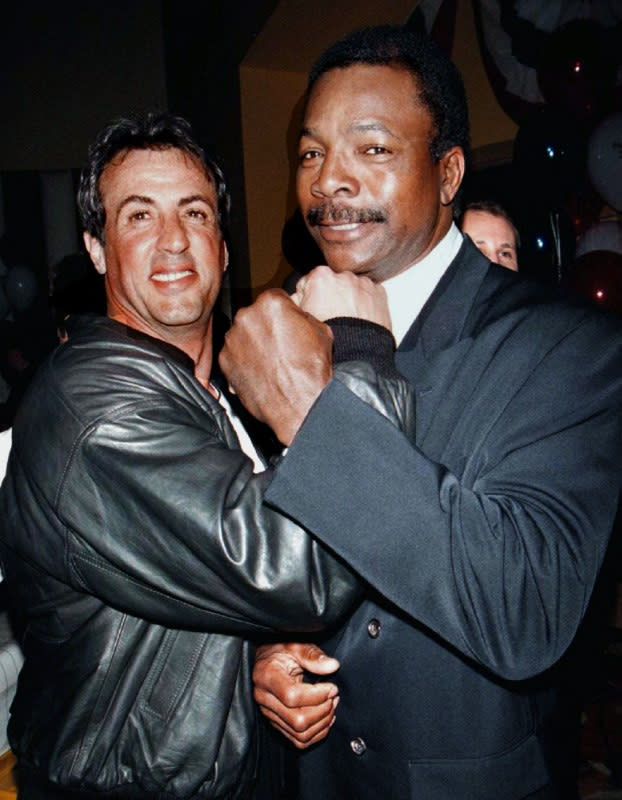 FOTO DE  ARCHIVO-Silvester Stallone y Carl Weathers asisten a una fiesta en el All Star Cafe de Nueva York con motivo del 20 aniversario de la película "Rocky"