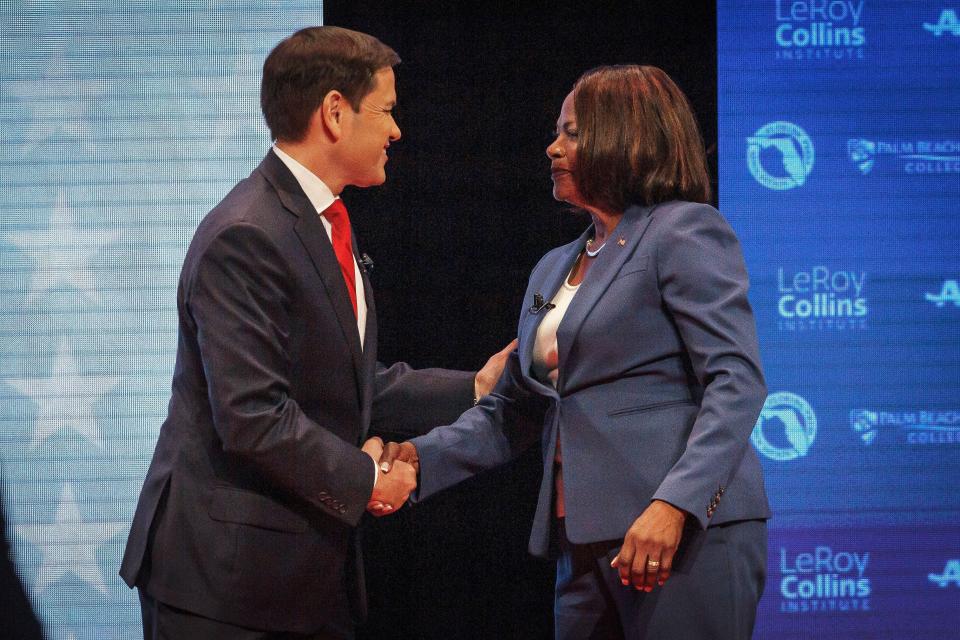 Sen. Marco Rubio (R-FL) and U.S. Rep. Val Demings (D-FL) greet each other before a televised debate at Duncan Theater an the campus of Palm Beach State College in Palm Beach County, Fla., on Tuesday, October 18, 2022.