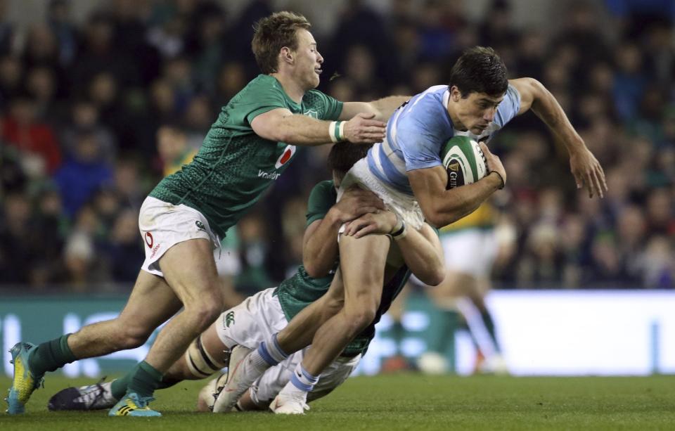 Argentina's Bautista Delguy is tackled during the rugby union international match between Ireland and Argentina, at the Aviva Stadium in Dublin, Ireland, Saturday, Nov. 10, 2018. (AP Photo/Peter Morrison)