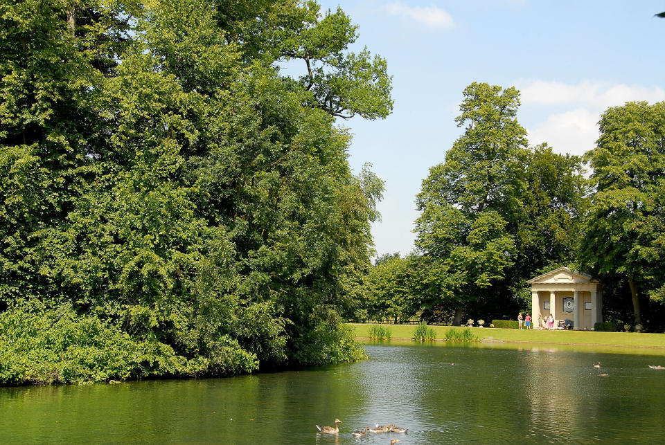 a long shot of Princess Diana's grave at Althorp Estate