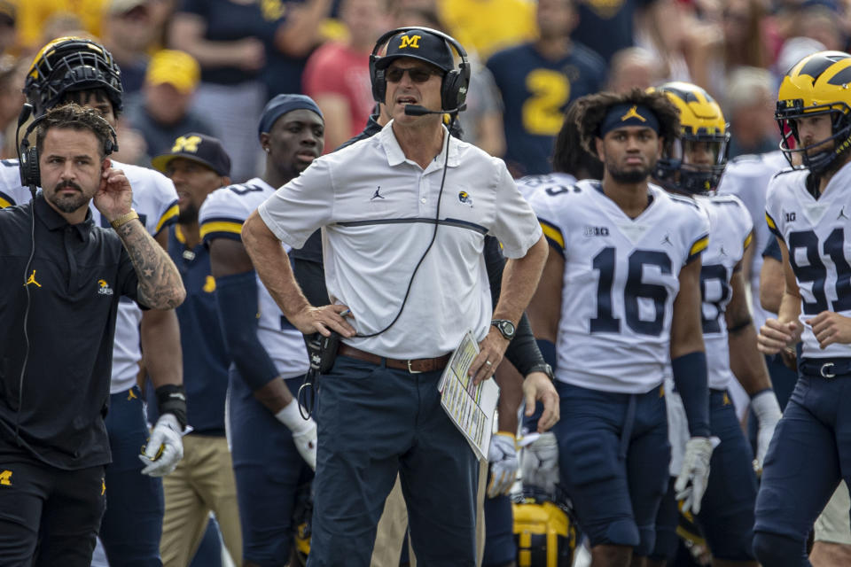 Michigan Wolverines coach Jim Harbaugh watches on during a college football game against Wisconsin Badgers on Oct. 2, 2021. (Dan Sanger/Icon Sportswire via Getty Images)