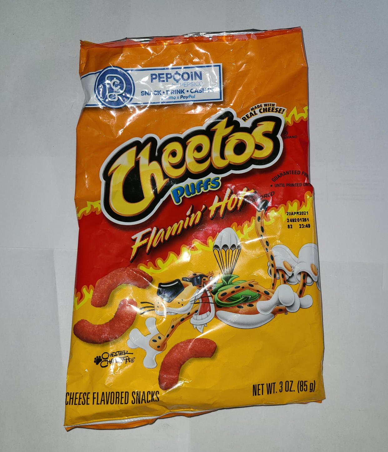 a bag of flaming hot cheetos puffs against a white background (Courtesy of Buford Horn Weasel)