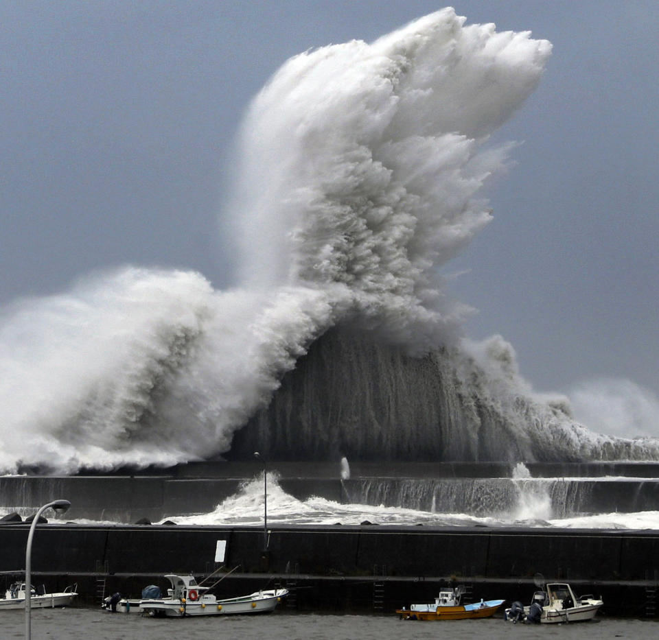 CORRECTS NAME OF PHOTOGRAPHER - High waves hit breakwaters at a port of Aki, Kochi prefecture, Japan, Tuesday, Sept. 4, 2018. Powerful Typhoon Jebi is approaching Japan's Pacific coast and forecast to bring heavy rain and high winds to much of the country. (Ichiro Banno/Kyodo News via AP)