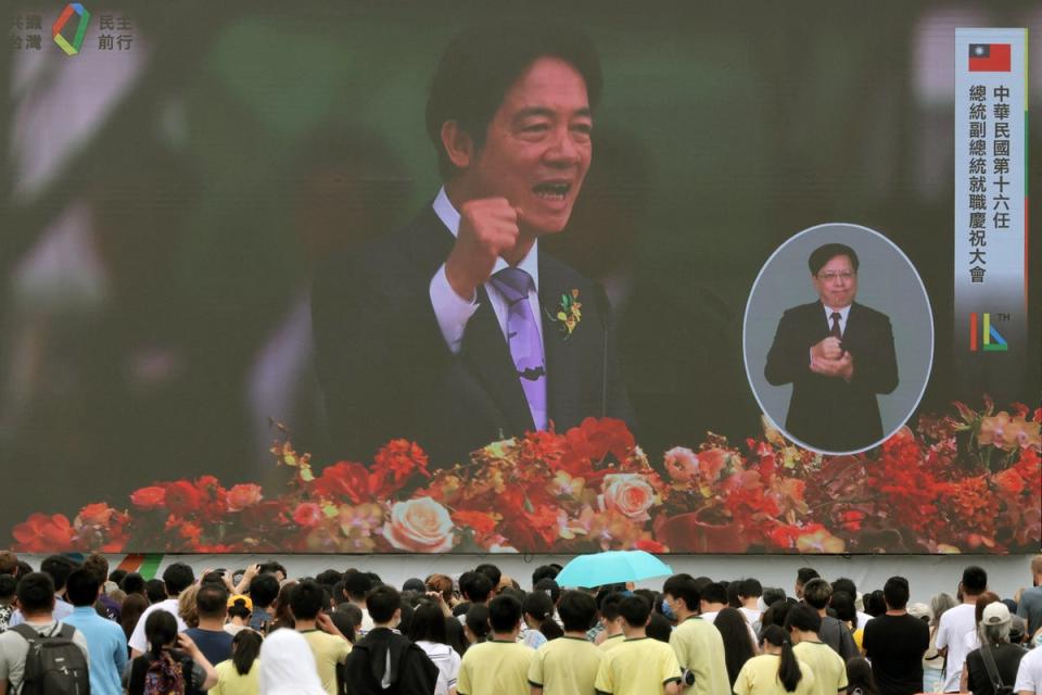 A screen shows Lai Ching-te delivering his inaugural speech as president (Getty)