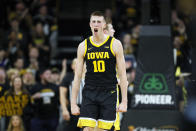 Iowa guard Joe Wieskamp celebrates during the second half of an NCAA college basketball game against Wisconsin, Monday, Jan. 27, 2020, in Iowa City, Iowa. Iowa won 68-62. (AP Photo/Charlie Neibergall)