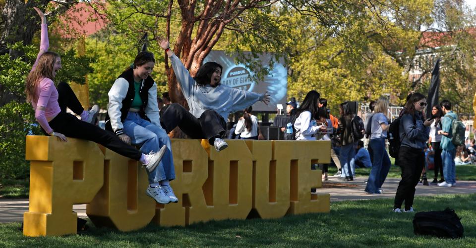 Students participate in the festivities during the Purdue Day of Giving event, Wednesday, April 26, 2023, at Purdue's Memorial Mall in West Lafayette, Ind.